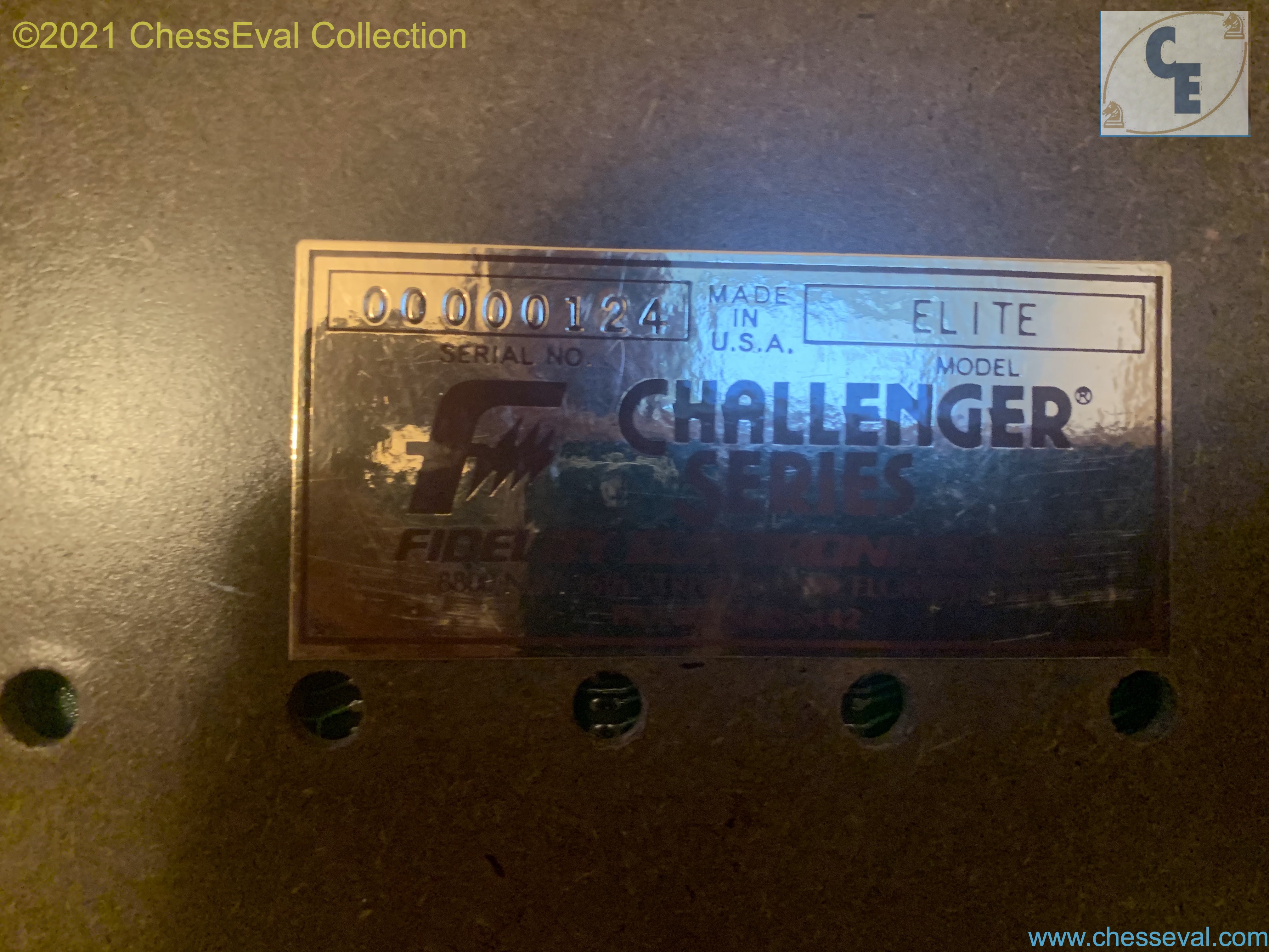 Manufacturer identification plate on the underside of the serial 124 specimen.